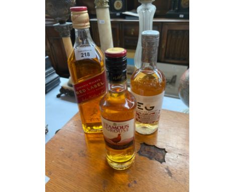 Three bottlings of 'Johnnie Walker' Red Label blended Scotch Whisky, Edinburgh Gin and The Famous Grouse Whisky. 