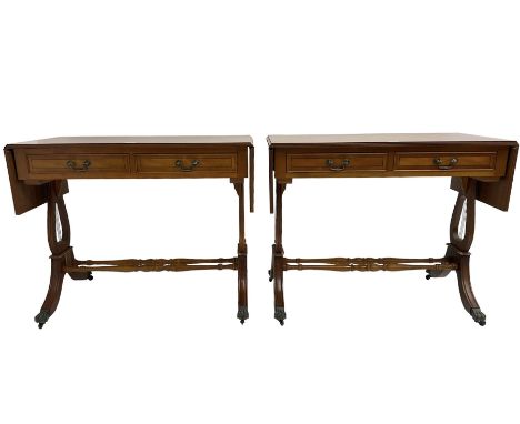 Pair yew wood drop leaf stretcher side or sofa tables, fitted with two drawers, on lyre shaped ends with splayed moulded supp