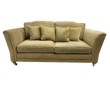 Three seater sofa, upholstered in cream fabricDimensions: Height:&nbsp;75cm&nbsp; Length/Width:&nbsp;205cm&nbsp; Depth/Diamet