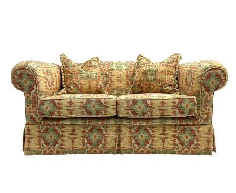 Two seat traditional shape sofa upholstered in Kilim print fabric, with scatter cushionsDimensions: Height:&nbsp;71cm&nbsp; L