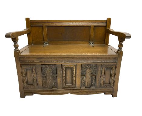 20th century oak monk's bench settle, hinged box seat over panelled front with carved arch decorationDimensions: Height:&nbsp