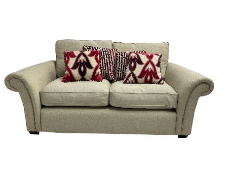 Two seater sofa, upholstered in cream fabricDimensions: Height:&nbsp;69cm&nbsp; Length/Width:&nbsp;182cm&nbsp; Depth/Diameter