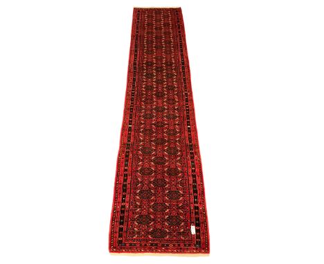 North West Persian Malayer red ground runner, the field decorated with repeating Herati motifs, multi-band border with geomet