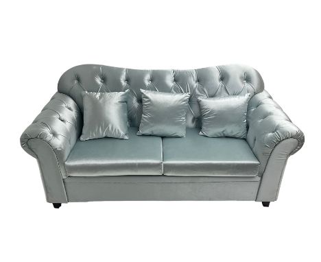 Chesterfield shaped two seat sofa, upholstered in buttoned light blue fabric, with scatter cushionsDimensions: Height:&nbsp;9