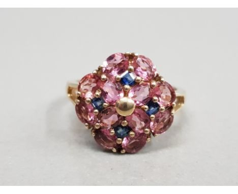 9CT CLUSTER RING FEATURING OVAL PINK STONES SET WITH 4 BLUE STONES SET INBETWEEN ALL STONES ARE CLAW SET SIZE N 3.1G GROSS