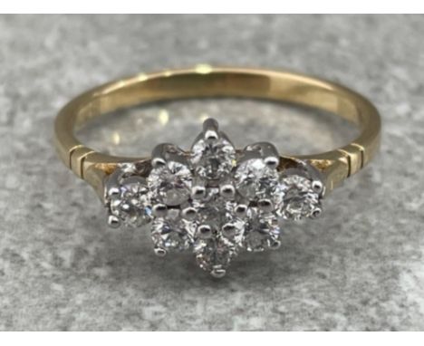 9CT GOLD DIAMOND CLUSTER RING COMPRISING OF NINE ROUND BRILLIANT CUT DIAMONDS APPROX .50CT 1.7G SIZE M1/2