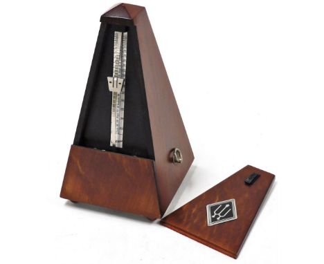 A Wittner metronome, 22cm high.