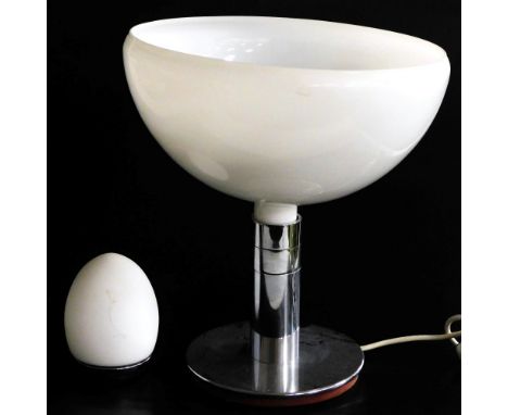 A futuristic table lamp, with an inverted opalescent glass shade, raised on a white metal stem and circular base, 41cm diamet