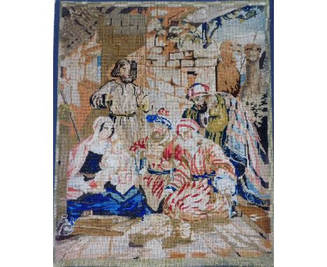 A Victorian tapestry panel, depicting card players and mother and child, 83cm x 68cm. 