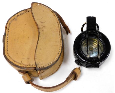 A World War II EAC military compass, MKIII, number B254735, cased. 