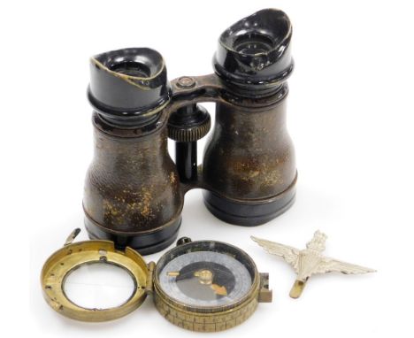 A World War II MKIX military pocket compass number CP810C, JR Gaunt Parachute Regiment cap badge, and a pair of binoculars. 
