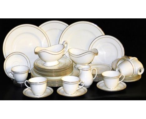 A Royal Worcester porcelain part dinner and tea service decorated in the Contessa pattern, comprising a pair of gravy boats, 