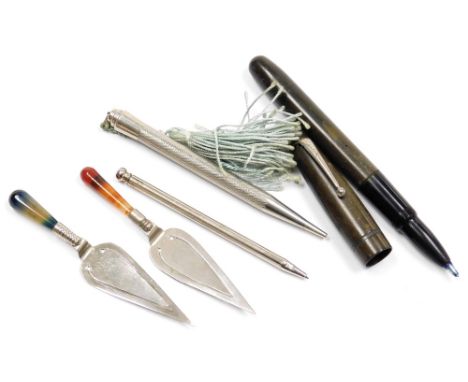 A vintage biro, Life-Long chrome propelling pencil, further propelling pencil, and two trowel form page markers, with agate h