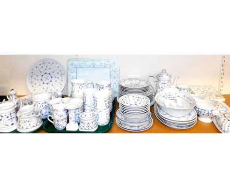 A 20thC German composite blue and white porcelain dinner tea and coffee service, decorated in a floral pattern, including ova