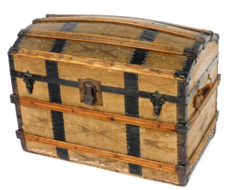 An early 20thC domed wrought iron and leather bound trunk, with pine strap work, painted owner's initials H P to side, 56cm h