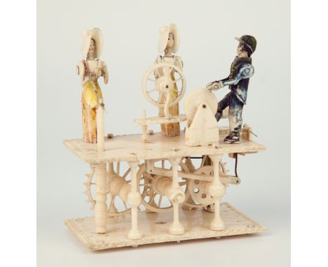 An early 19th century Napoleonic Prisoner of War spinning jenny bone automaton, French, with two partially painted polychrome