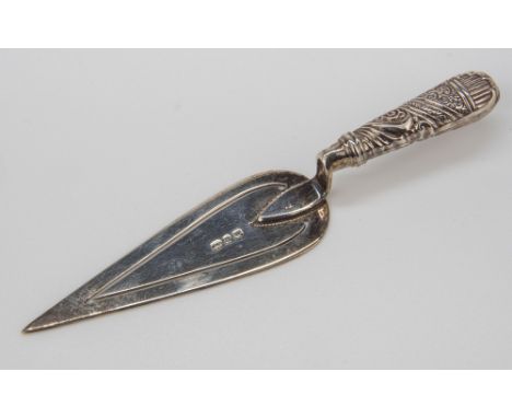A Victorian silver trowel form bookmark, Birmingham 1887, chased handle, 3½in. (8.8cm.) long, 0.16 tr.oz.