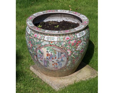 A large Cantonese style planter, of ovoid form with stylised panel decoration, 18in. (45.7cm) high.