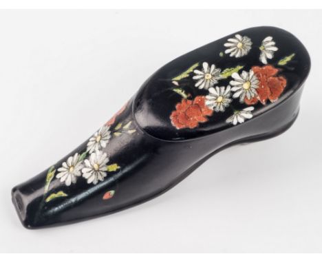 A lacquered floral painted shoe form snuff box, polychrome design, with tapered square toe and side hinged lid, 3 ¼ in. (8.2c