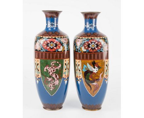 A pair of Japanese cloisonné vases, of square ovoid form with narrow neck and flared rim, polychrome enamel work with stylise