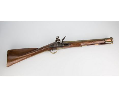 A flintlock blunderbuss by Heylin of London, late 18th century, brass telescopic form barrel 15.¾in. (40cm) over full walnut 
