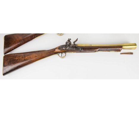 A brass barrel flintlock blunderbuss by Twigg, c.1780, with two-stage barrel and ovoid muzzle, London proof, chamfered top en