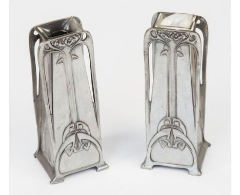 A pair of W.M.F. polished pewter vases, of tapering rectangular form with stylised Art Nouveau long stem floral decoration, o