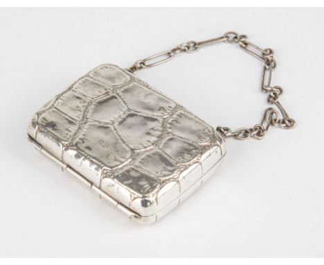 A Victorian silver ring purse, F&W, Birmingham 1886, rectangular form, embossed crocodile skin design, push button release hi