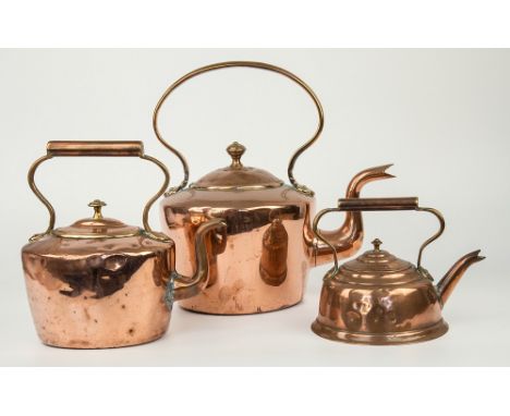 A late 19th century copper kettle, of dovetail construction, shaped hoop handle into trefoil feet, domed cover with knopped f