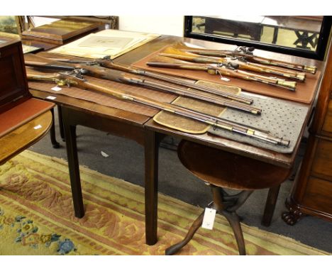 A late George III gate leg mahogany table, 