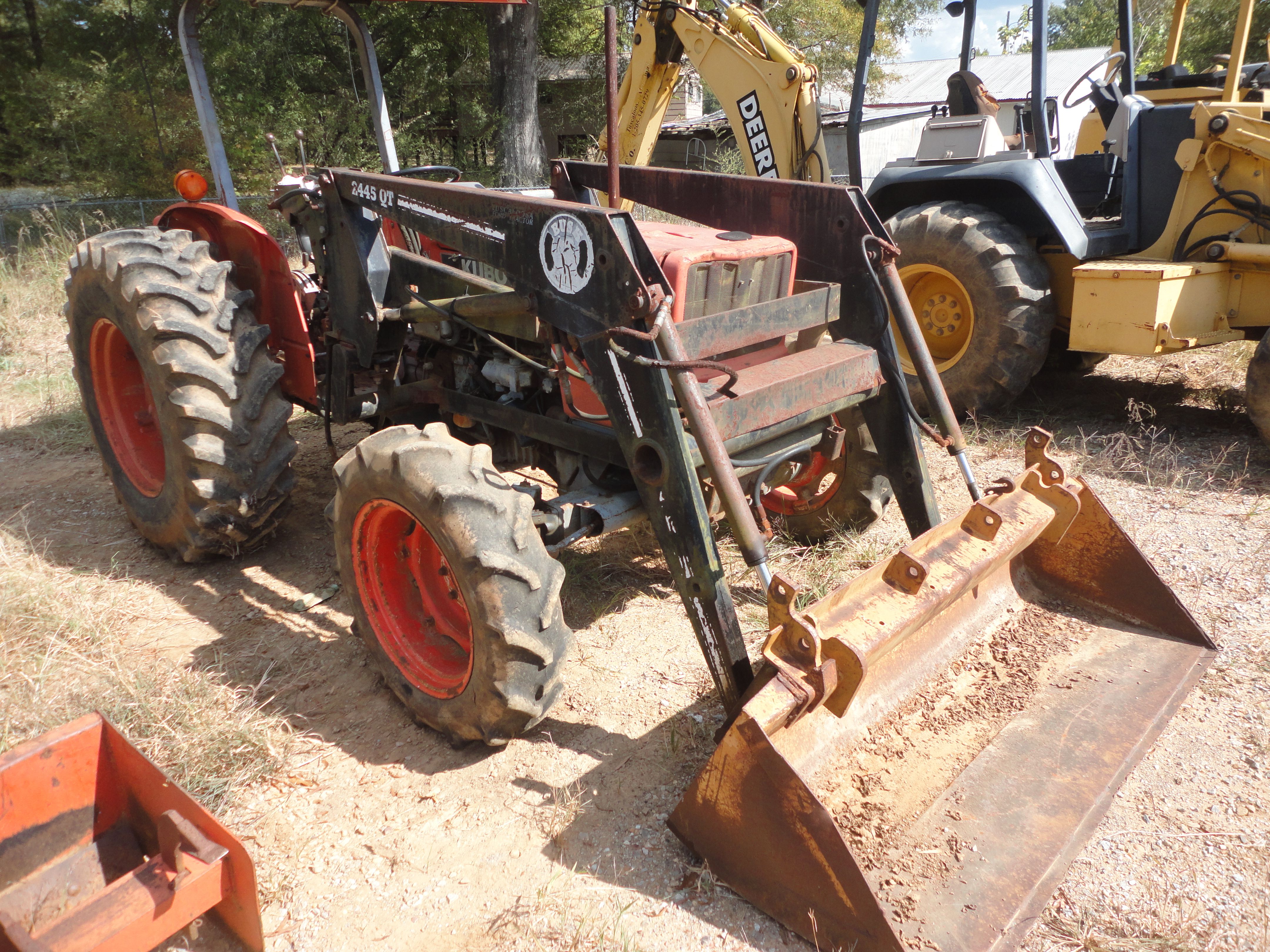 KUBOTA MODEL M5030SU FARM TYPE TRACTOR W/ BUSH HOG MODEL 2445QT FRONT