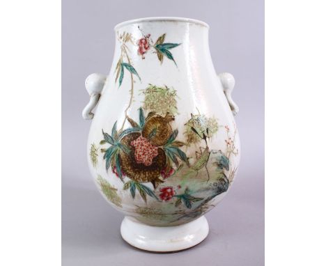 A GOOD CHINESE REPUBLIC STYLE FAMILLE VERTE PORCELAIN TWIN HANDLE VASE, decorated with insects and native flora, twin elephan