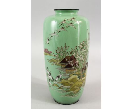 A FINE JAPANESE MEIJI PERIOD SILVER WIRE CLOISONNE VASE , The pale green ground with silver wire depicting native waterside c