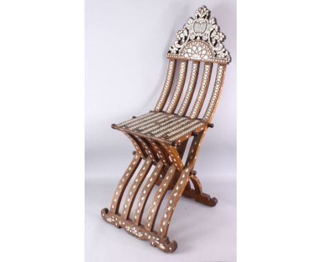 A 19TH CENTURY OR EARLIER ISLAMIC WOOD AND MOTHER OF PEARL FOLDING CHAIR, with inlaid wire and mother of pearl decoration in 