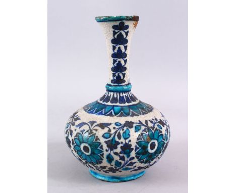 A 19TH CENTURY OR EARLIER PERSIAN POTTERY BOTTLE VASE, decorated with formal floral motif, 25cm, (AF)