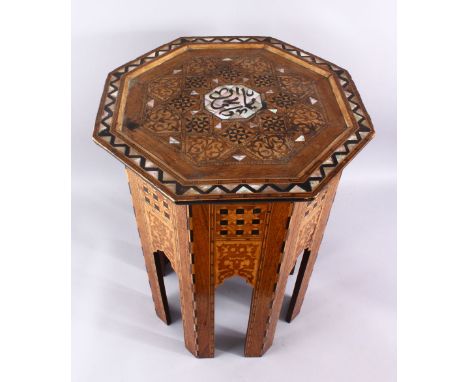 A 19TH CENTURY MOORISH EXOTIC WOOD INLAID AND MOTHER OF PEARL OCTAGONAL TABLE, inlaid with mother of pearl calligraphy and ex