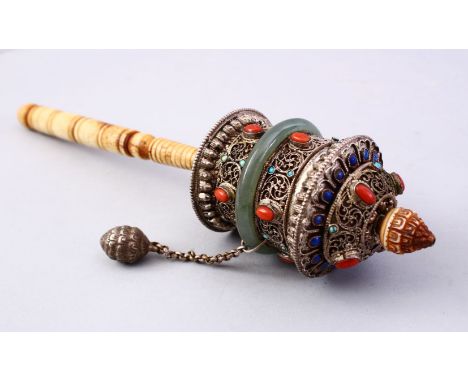 A GOOD 19TH CENTURY TIBETAN WHITE METAL AND INLAID PRAYER WHEEL, the wheel with filigree style metal work with inlaid turquoi
