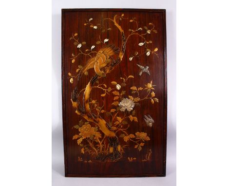 A JAPANESE MEIJI PERIOD GOLD LACQUER SHIBAYAMA PANEL, depicting a hawk upon a tree looking down at its prey, with a carved mo