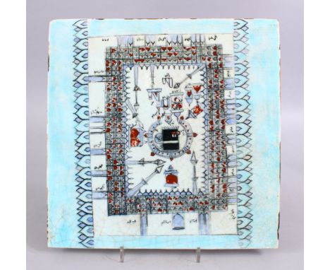 A LARGER ISLAMIC KABE POTTERY TILE, with a pale turquoise glaze, central decoration with Arabic calligraphy 29.5cm