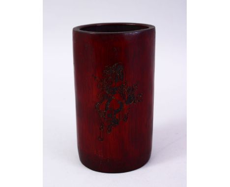 A GOOD 19TH CENTURY CHINESE CARVED BAMBOO BRUSH WASH, carved with a dragon and calligraphy, 14cm.