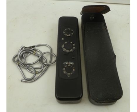 A MINOX "SPY" CAMERA, black cased, 12cm x 3cm with metal cord, in protective carry case 