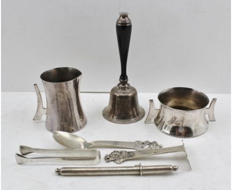 A SELECTION OF SILVER AND SILVER PLATED ITEMS comprising; a late 20th century silver hand bell with ebonised handle, a Contin