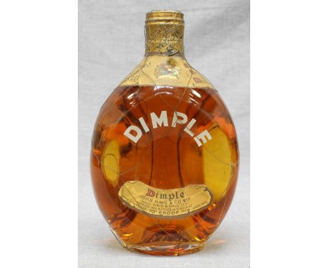 A bottle of Dimple Scotch Whisky by John Haig & co, 70 proof 40% volume