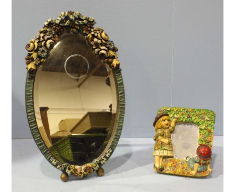 A Barbola ceramic mirror, oval shaped on easel, decorated with colourful ceramic flowers, 57cm long, together with a ceramic 