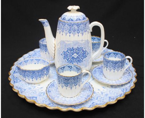 SECTION 25. A late 19th century Spode Copeland Cabaret set, decorated with blue and white Alhambra pattern with gilt rims, co