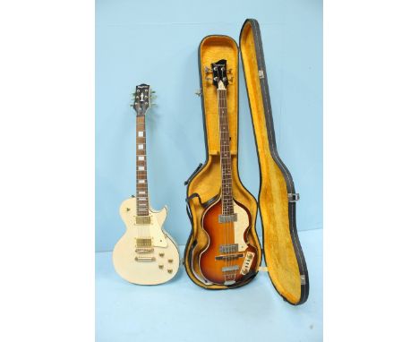 A 'Tanglewood' base guitar (Paul McCartney replica), in hard case, together with a 'Tanglewood' Les Paul 'style' electric gui