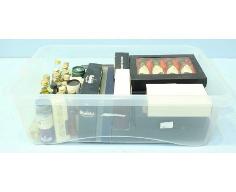 A collection of approximately 67 miniature bottles of Malt Scotch Whisky (in plastic crate)