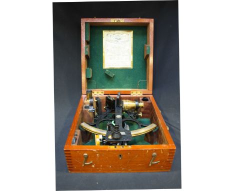 A Henry Hughes and Sons (admiralty instrument makers) sextant, 6" - 10" black lacquered with lenses and housed in a mahogany 