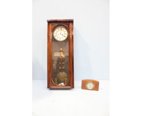 A Smiths car clock, with silvered dial and Arabic numerals, in an oak mount, 7 cm dial together with a Victorian Vienna style