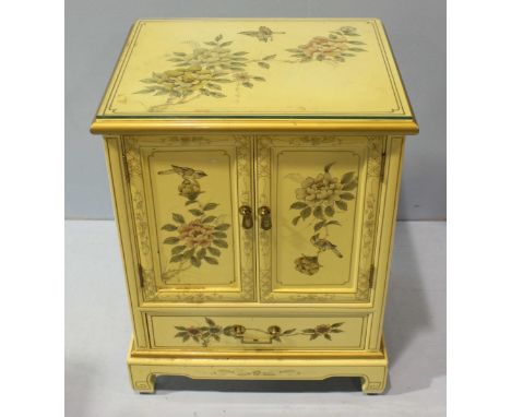 A modern oriental painted cupboard, with a pair of cupboard doors above a single drawer, raised on shaped bracket feet, paint